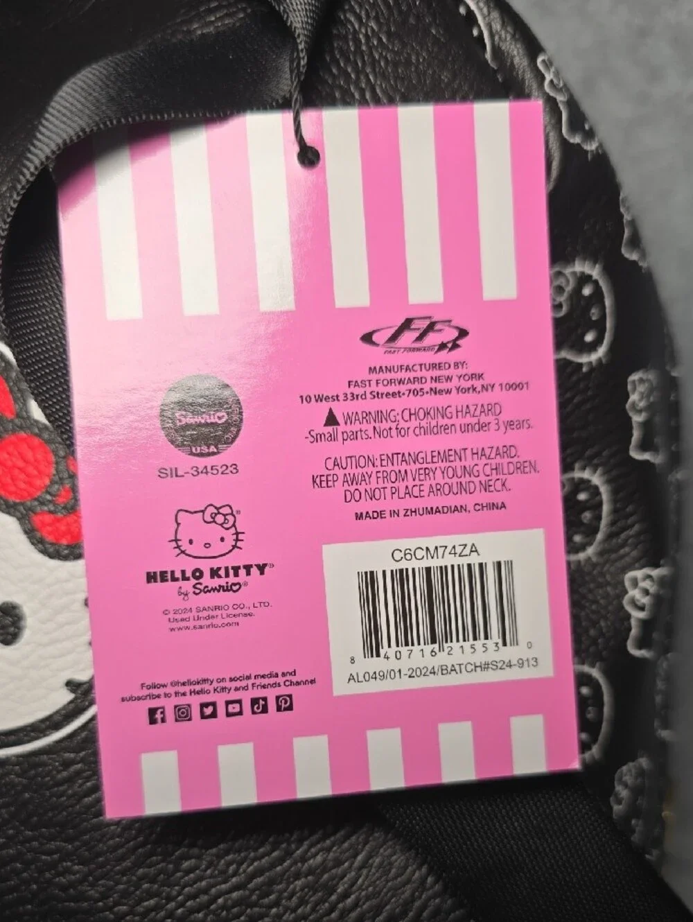 Sanrio Hello Kitty Black Backpack with Red Bow and Gold Accent